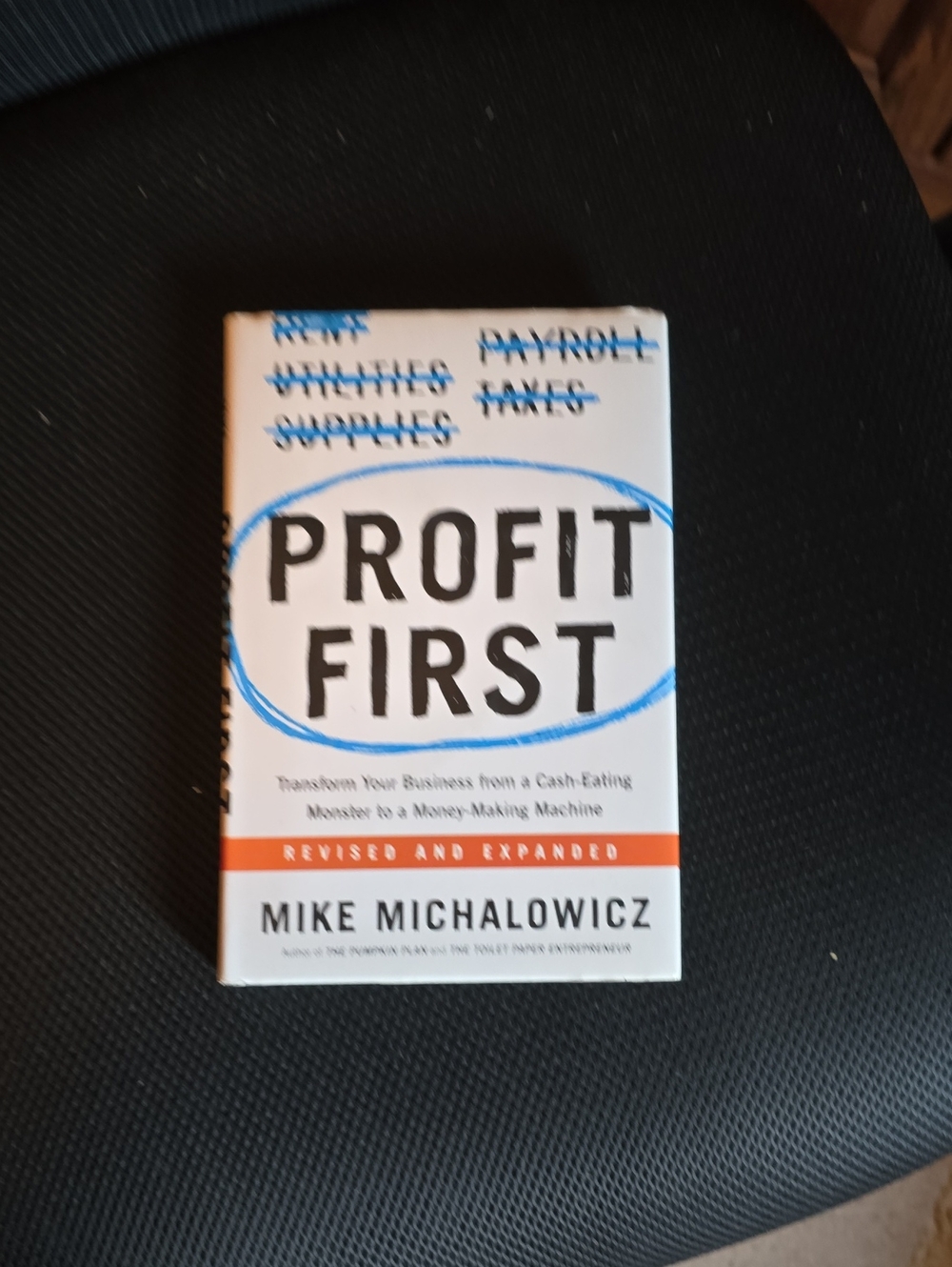 Profit First by Mike Michalowicz - White Cover with Blue Accents